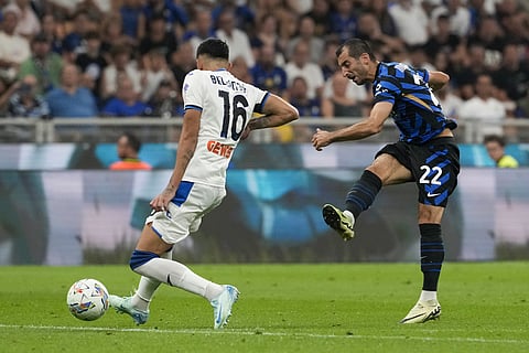 Serie A 2024-24, Inter Milan vs Atalanta: Inter Milan's Henrikh Mkhitaryan, right, attempts a shot on goal